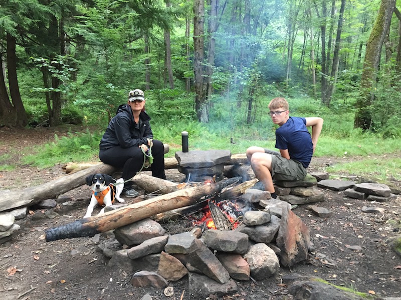 The large stone fire ring can hold up some sizable logs