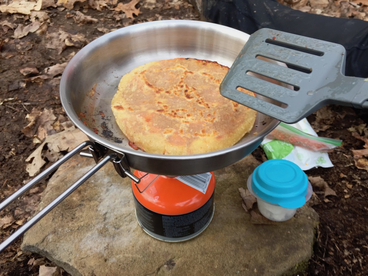 A pan fried tortilla pizza