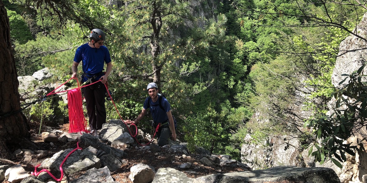 Doug belaying Matt, on his amazingly bright pink rope, up Skyline