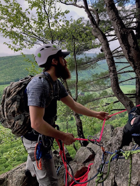 Mark belaying Matt across an easy traverse