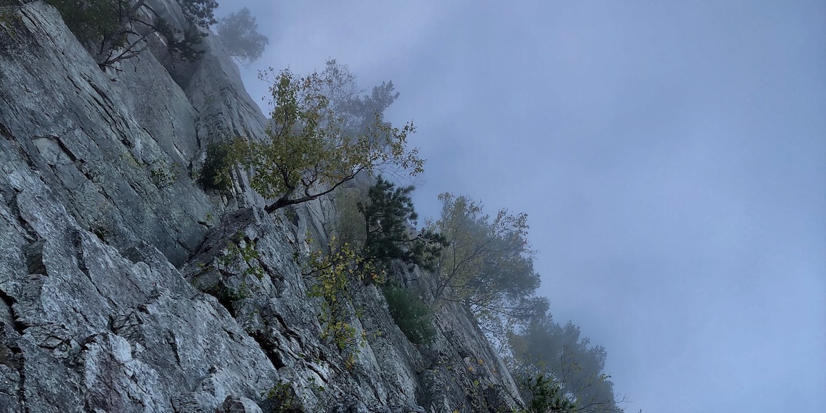 Looking at the foggy summit from the start of Old Man's