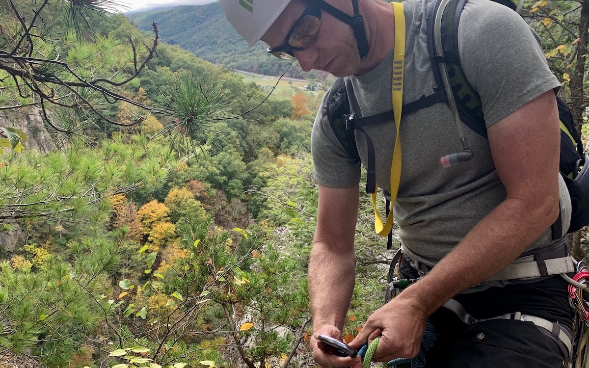 Preparing to belay from the top of the third pitch of Skyline