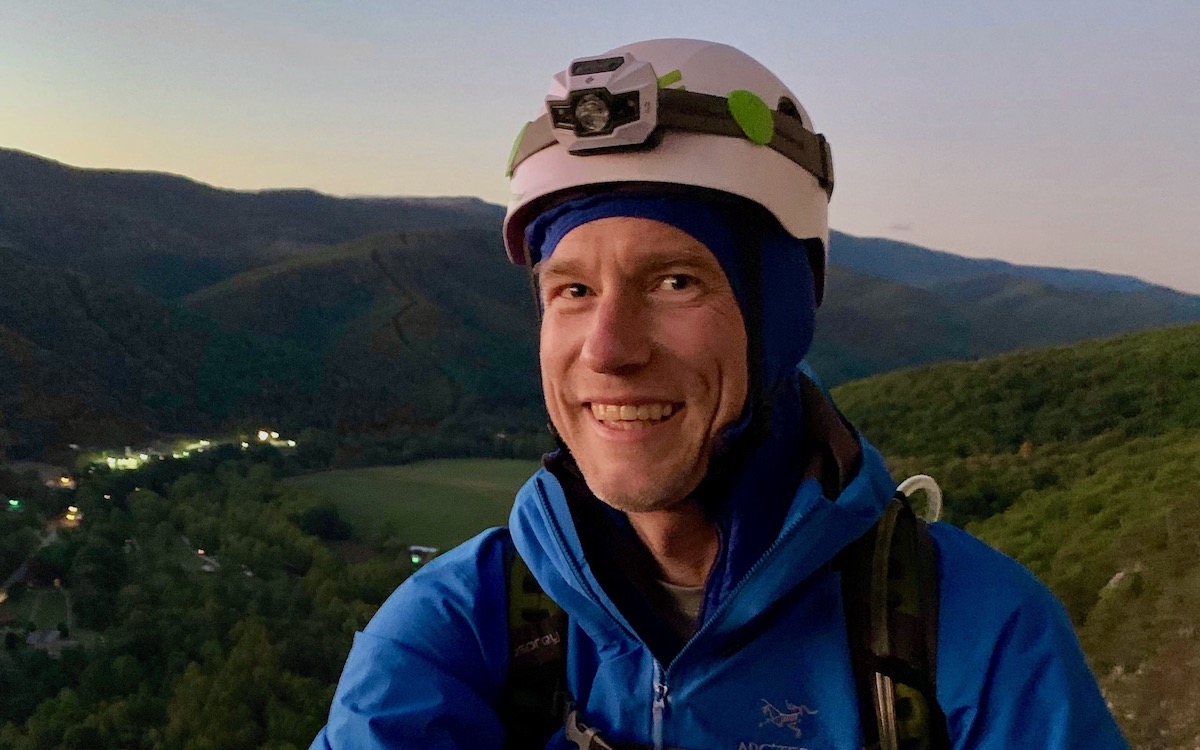 Me preparing to make the second rappel at dusk