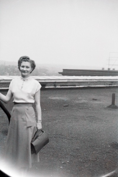 A woman on top of the United Building